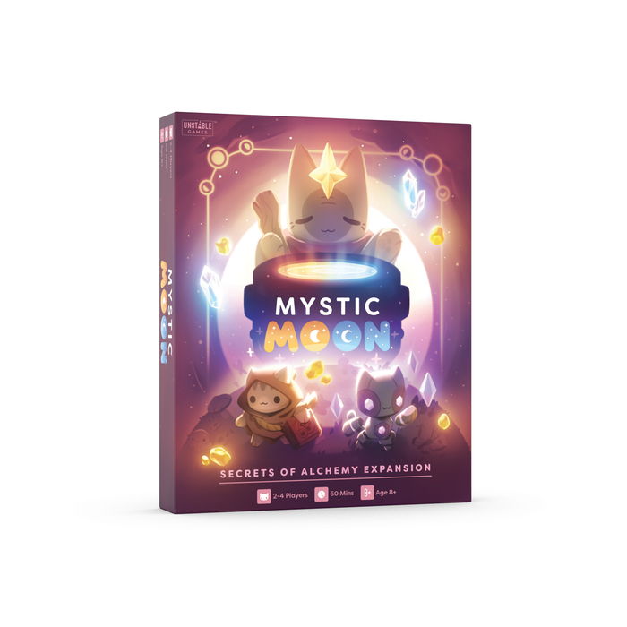 Mystic Moon Alchemy Expansion - the box is tones of yellow, red and purple and has a witch cat above a cauldron with two other witch cat characters below it