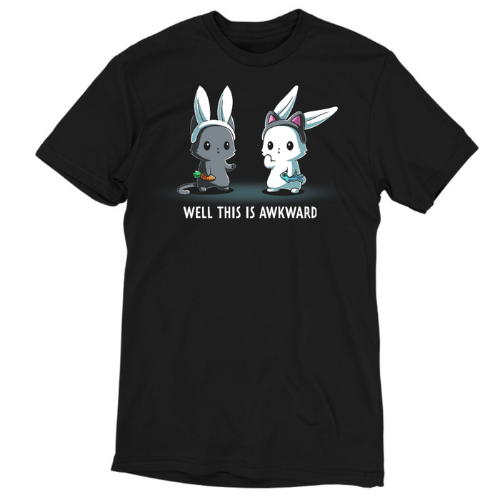 Premium Cotton T-shirt_TeeTurtle black Well This Is Awkward Premium Cotton T-shirt featuring a a cat in bunny ears holding a carrot and a bunny in cat ears holding a piece of fish. Both look unsettled. Text at the bottom reads "Well This Is Awkward"